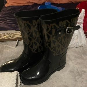 Michael Kors rain boots, slightly worn. Size 9.